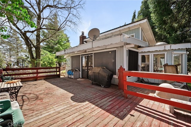 deck featuring grilling area