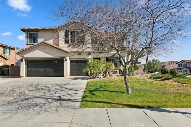 traditional-style house with a tiled roof, a garage, stucco siding, a front yard, and driveway