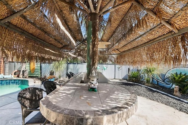 view of patio / terrace featuring a fenced in pool and a fenced backyard