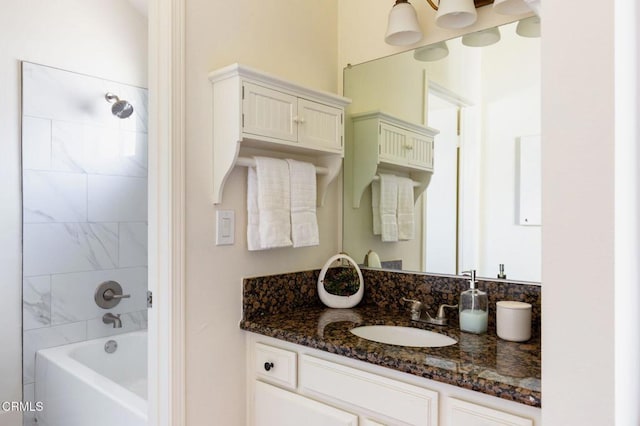 full bath featuring vanity and shower / bathing tub combination