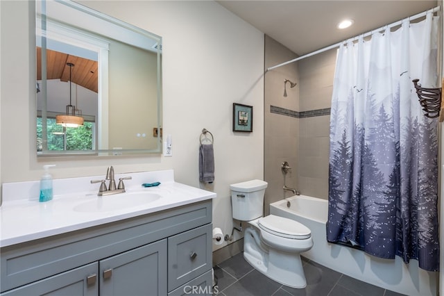 full bathroom with shower / bath combo, vanity, tile patterned floors, toilet, and lofted ceiling