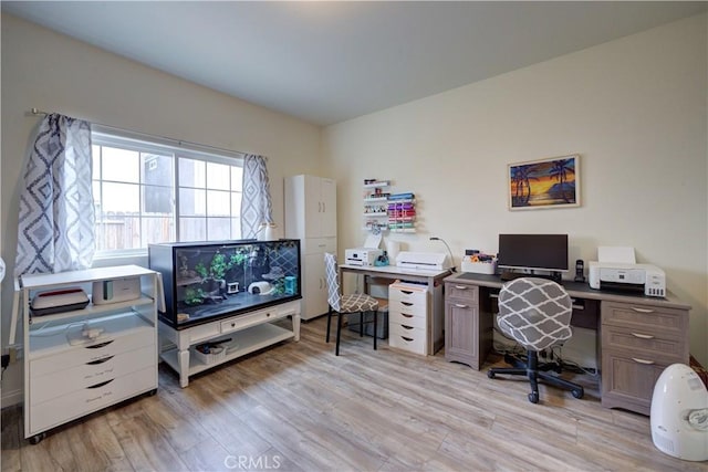 home office featuring light wood-type flooring