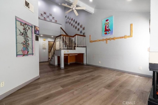 21269 Cottonwood Ln, Walnut, CA 91789 - unfurnished living room featuring visible vents, a ceiling fan, wood finished floors, stairs, and high vaulted ceiling