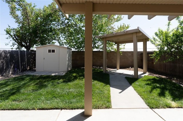 4214 Berryesa Ave, Merced, CA 95348 - view of yard with a storage shed, an outbuilding, and a fenced backyard