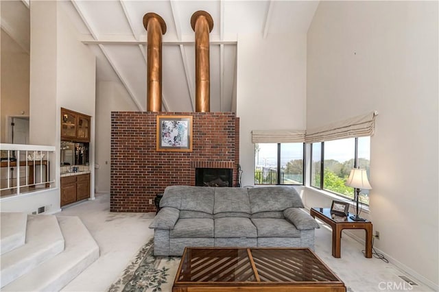10 Mela Ln, Rancho Palos Verdes, CA 90275 - living room with light colored carpet, a brick fireplace, and high vaulted ceiling