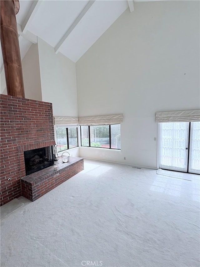 10 Mela Ln, Rancho Palos Verdes, CA 90275 - unfurnished living room with high vaulted ceiling, carpet flooring, a brick fireplace, and beamed ceiling
