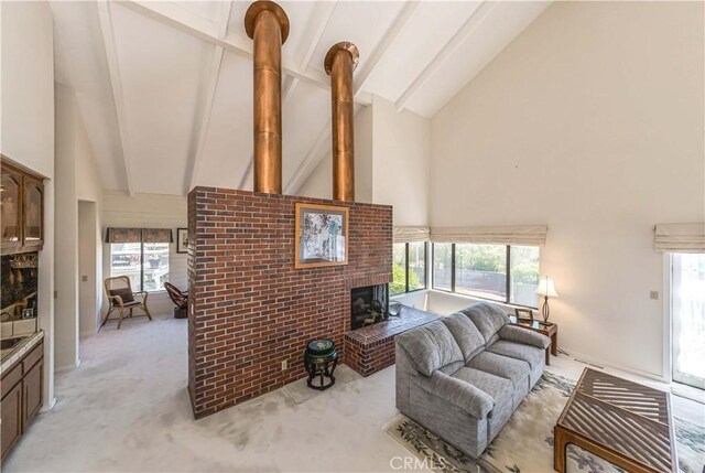 10 Mela Ln, Rancho Palos Verdes, CA 90275 - living room with high vaulted ceiling, a wealth of natural light, beamed ceiling, light colored carpet, and a brick fireplace