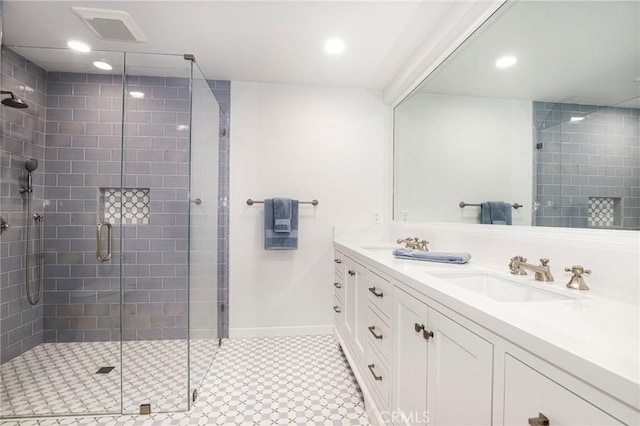 335 Sycamore Gln, Pasadena, CA 91105 - bathroom with double vanity, visible vents, a shower stall, and a sink