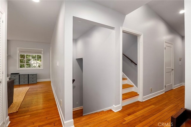 335 Sycamore Gln, Pasadena, CA 91105 - hallway featuring hardwood / wood-style flooring, stairs, and baseboards