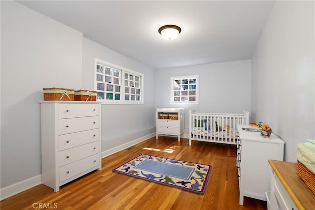335 Sycamore Gln, Pasadena, CA 91105 - bedroom featuring baseboards and wood finished floors