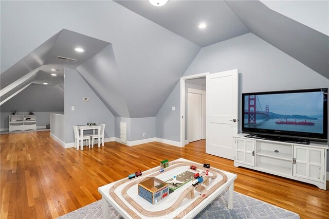 335 Sycamore Gln, Pasadena, CA 91105 - living area with lofted ceiling, baseboards, visible vents, and wood finished floors