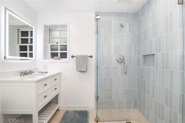 335 Sycamore Gln, Pasadena, CA 91105 - bathroom with a stall shower, vanity, and baseboards