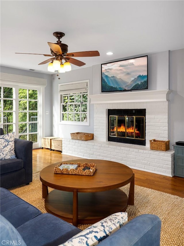 335 Sycamore Gln, Pasadena, CA 91105 - living room featuring a ceiling fan, a fireplace, and wood finished floors