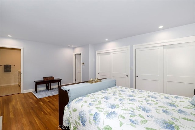 335 Sycamore Gln, Pasadena, CA 91105 - bedroom featuring wood finished floors, two closets, ensuite bathroom, baseboards, and recessed lighting