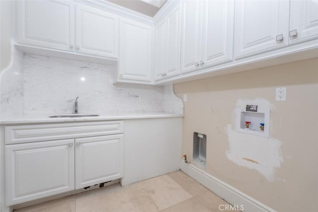 271 W Le Roy Ave, Arcadia, CA 91007 - laundry room featuring cabinet space, washer hookup, and light tile patterned floors
