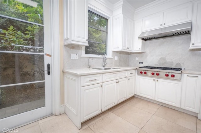 271 W Le Roy Ave, Arcadia, CA 91007 - kitchen with under cabinet range hood, stainless steel gas stovetop, light countertops, and tasteful backsplash