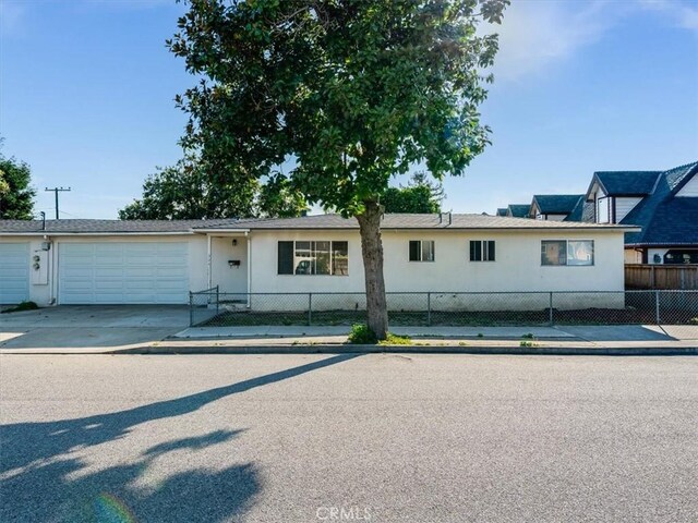 324 Short St, Arroyo Grande, CA 93420 - single story home with a garage, driveway, and a fenced front yard