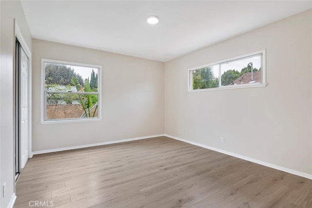8856 Fullbright Ave, Winnetka, CA 91306 - spare room with baseboards and light wood finished floors