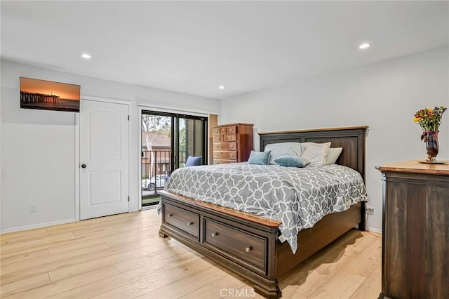 bedroom with access to outside, recessed lighting, light wood-style flooring, and baseboards