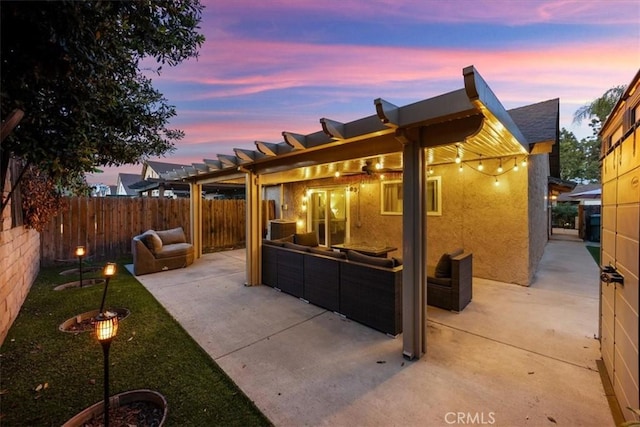13202 Ballestros Ave, Chino, CA 91710 - back of property featuring stucco siding, a fenced backyard, a pergola, and a patio area