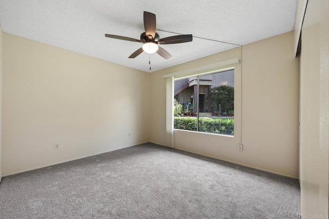 6560 College Grove Dr Unit 79, San Diego, CA 92115 - unfurnished room with baseboards, ceiling fan, and carpet flooring