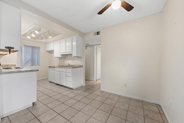 6560 College Grove Dr Unit 79, San Diego, CA 92115 - kitchen featuring visible vents, white dishwasher, ceiling fan, light countertops, and white cabinetry