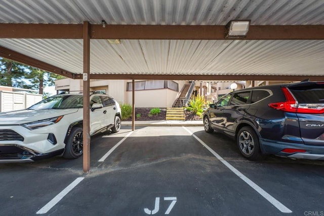 6560 College Grove Dr Unit 79, San Diego, CA 92115 - covered parking lot with stairway
