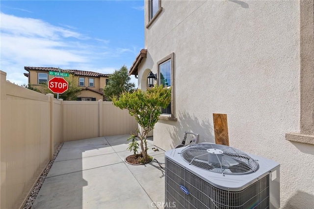 45477 Calle Cirros, Temecula, CA 92592 - view of patio featuring central AC unit