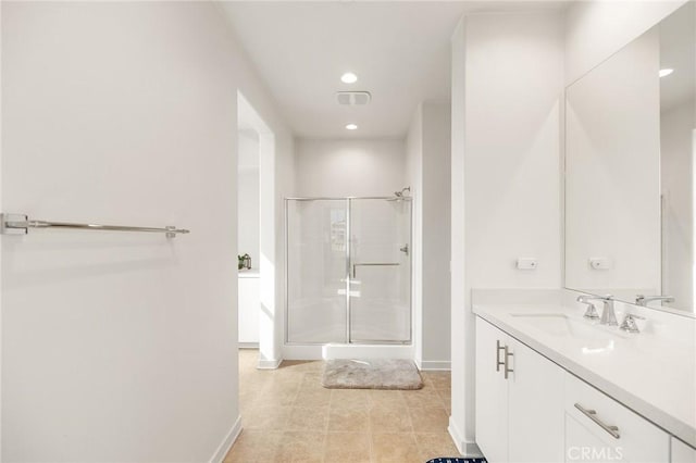 45477 Calle Cirros, Temecula, CA 92592 - bathroom with a stall shower, vanity, baseboards, recessed lighting, and tile patterned floors
