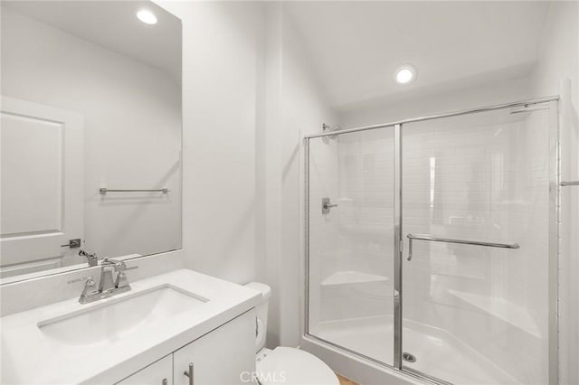 45477 Calle Cirros, Temecula, CA 92592 - full bathroom with a stall shower, toilet, vanity, and recessed lighting