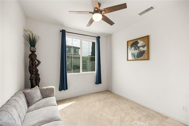 45477 Calle Cirros, Temecula, CA 92592 - living room with ceiling fan, light colored carpet, and baseboards