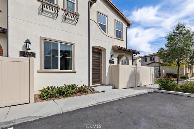 45477 Calle Cirros, Temecula, CA 92592 - view of front of house with stucco siding