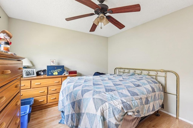 16407 Gabarda Rd, San Diego, CA 92128 - bedroom featuring light wood finished floors, ceiling fan, and baseboards