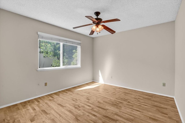 16407 Gabarda Rd, San Diego, CA 92128 - unfurnished room featuring wood finished floors, a textured ceiling, and ceiling fan