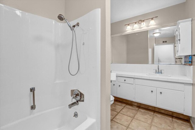 16407 Gabarda Rd, San Diego, CA 92128 - full bathroom with vanity, shower / washtub combination, backsplash, and tile patterned flooring