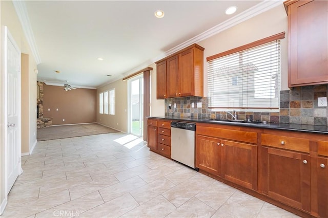 kitchen featuring tasteful backsplash, a sink, brown cabinetry, dishwasher, and ornamental molding