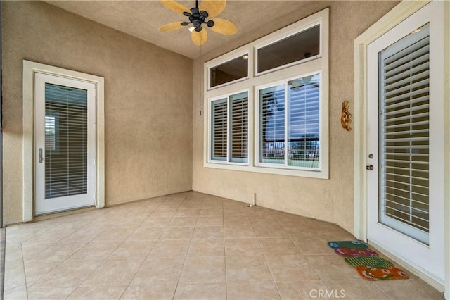 view of patio with a ceiling fan