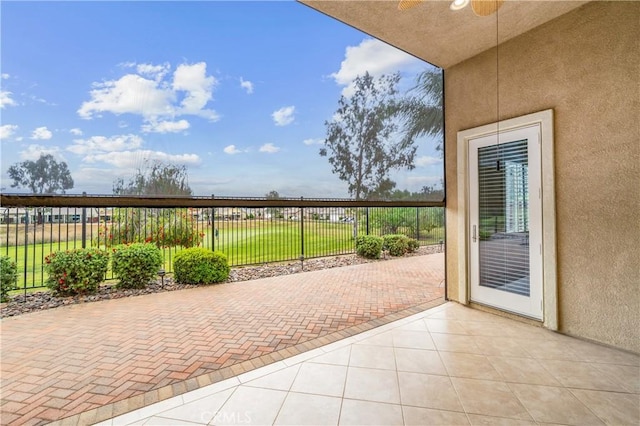 view of patio featuring fence