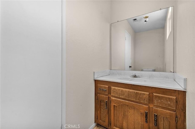 half bath with toilet and vanity