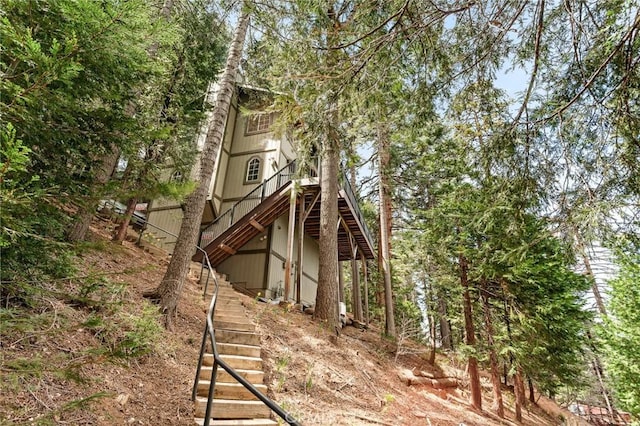 back of house with stairway