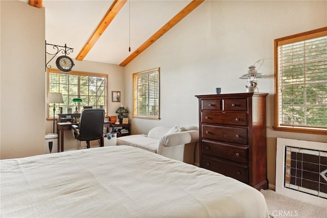 bedroom with vaulted ceiling with beams and a fireplace