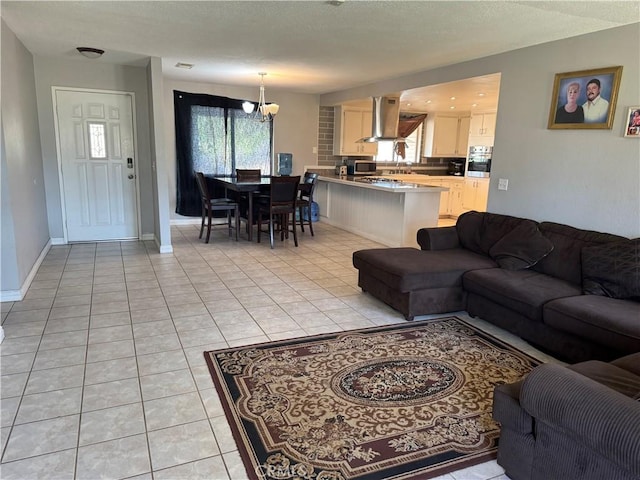 17665 Juniper St, Hesperia, CA 92345 - living area with an inviting chandelier and light tile patterned flooring