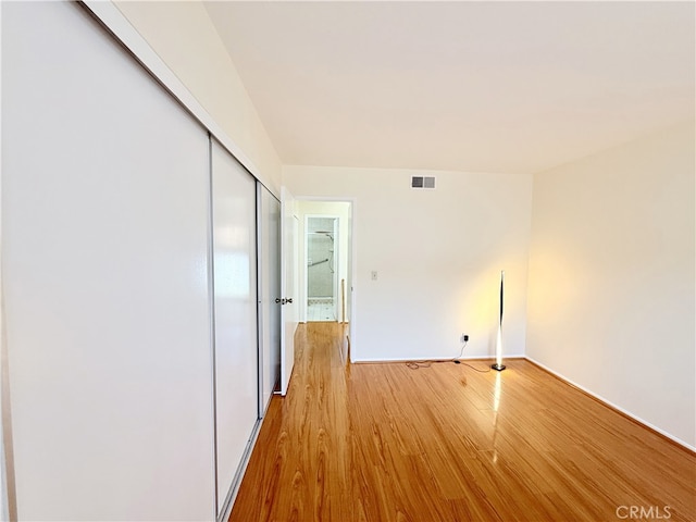 732 W Lambert Rd Unit 30, La Habra, CA 90631 - empty room with visible vents, baseboards, and light wood-style flooring
