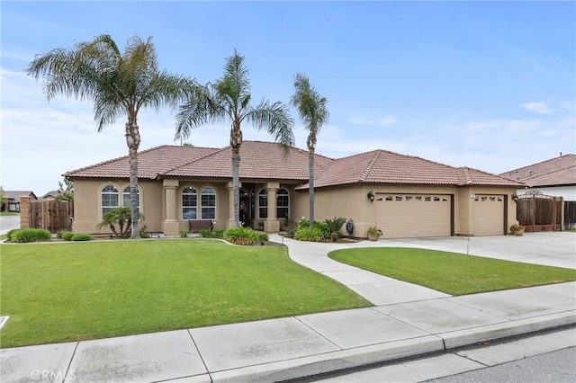 single story home featuring a front yard, stucco siding, a tiled roof, and an attached garage