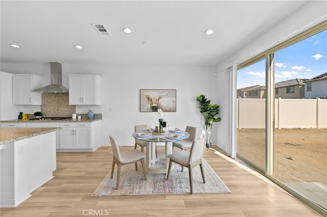 29553 Tulipwood St, Menifee, CA 92584 - dining space featuring visible vents, baseboards, recessed lighting, and light wood-style floors