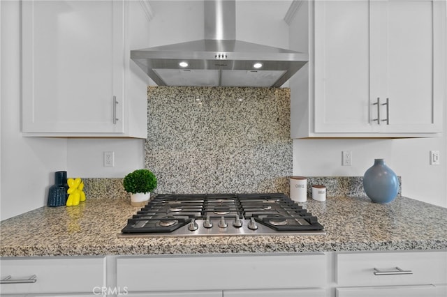 29553 Tulipwood St, Menifee, CA 92584 - kitchen with decorative backsplash, wall chimney exhaust hood, white cabinets, and stainless steel gas stovetop
