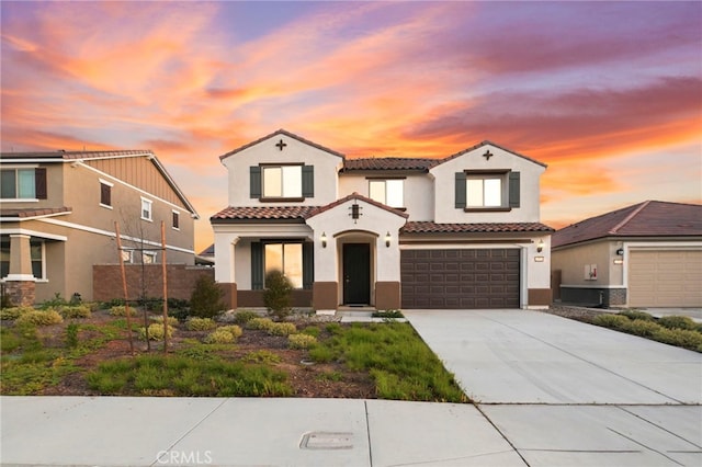 29553 Tulipwood St, Menifee, CA 92584 - mediterranean / spanish-style house featuring concrete driveway, stucco siding, a tiled roof, and an attached garage