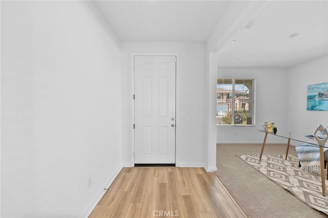 29553 Tulipwood St, Menifee, CA 92584 - foyer entrance featuring light wood-style flooring and baseboards