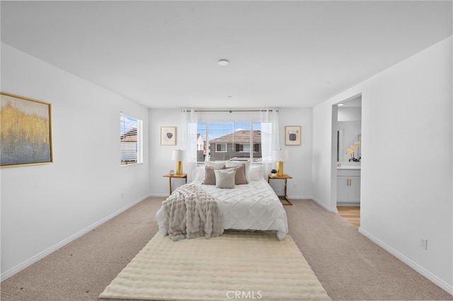 29553 Tulipwood St, Menifee, CA 92584 - bedroom featuring ensuite bathroom, baseboards, and light carpet