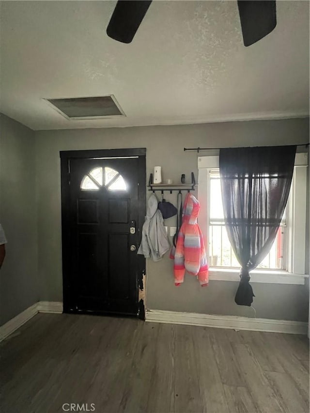 664 W 14th St, San Bernardino, CA 92405 - entrance foyer featuring a wealth of natural light, baseboards, and wood finished floors